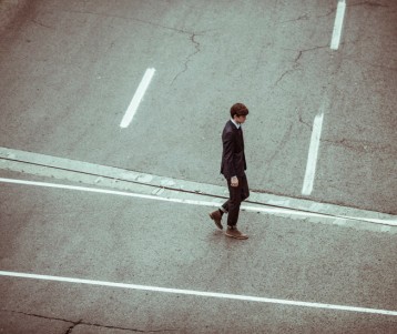 businessman-crossing-disappointed-201-653x550